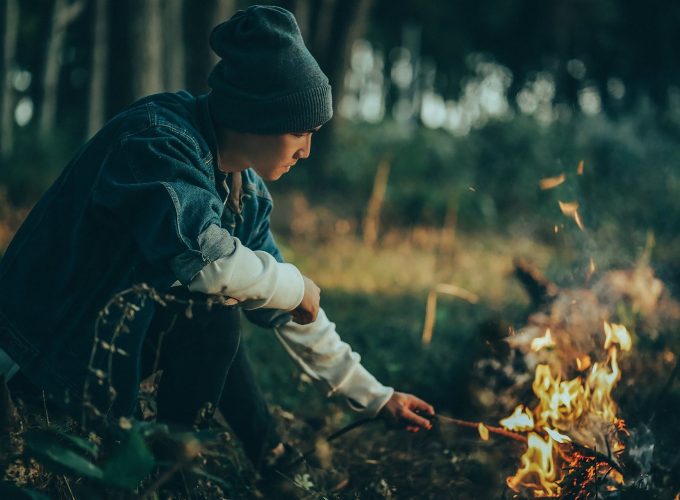 Man Burning Campfire